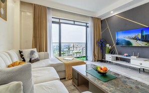 TV, books - Lavish One Bedroom with Gym, Kids Play Area and excellent City Views Views (Nairobi)