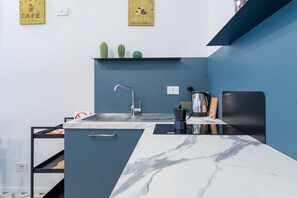Fridge, stovetop, cookware/dishes/utensils