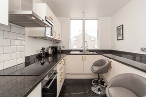 Microwave, oven, cookware/dishes/utensils