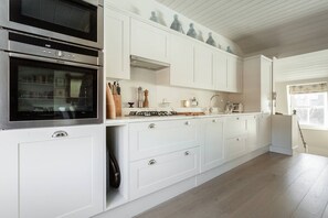 Fridge, microwave, dishwasher, coffee/tea maker