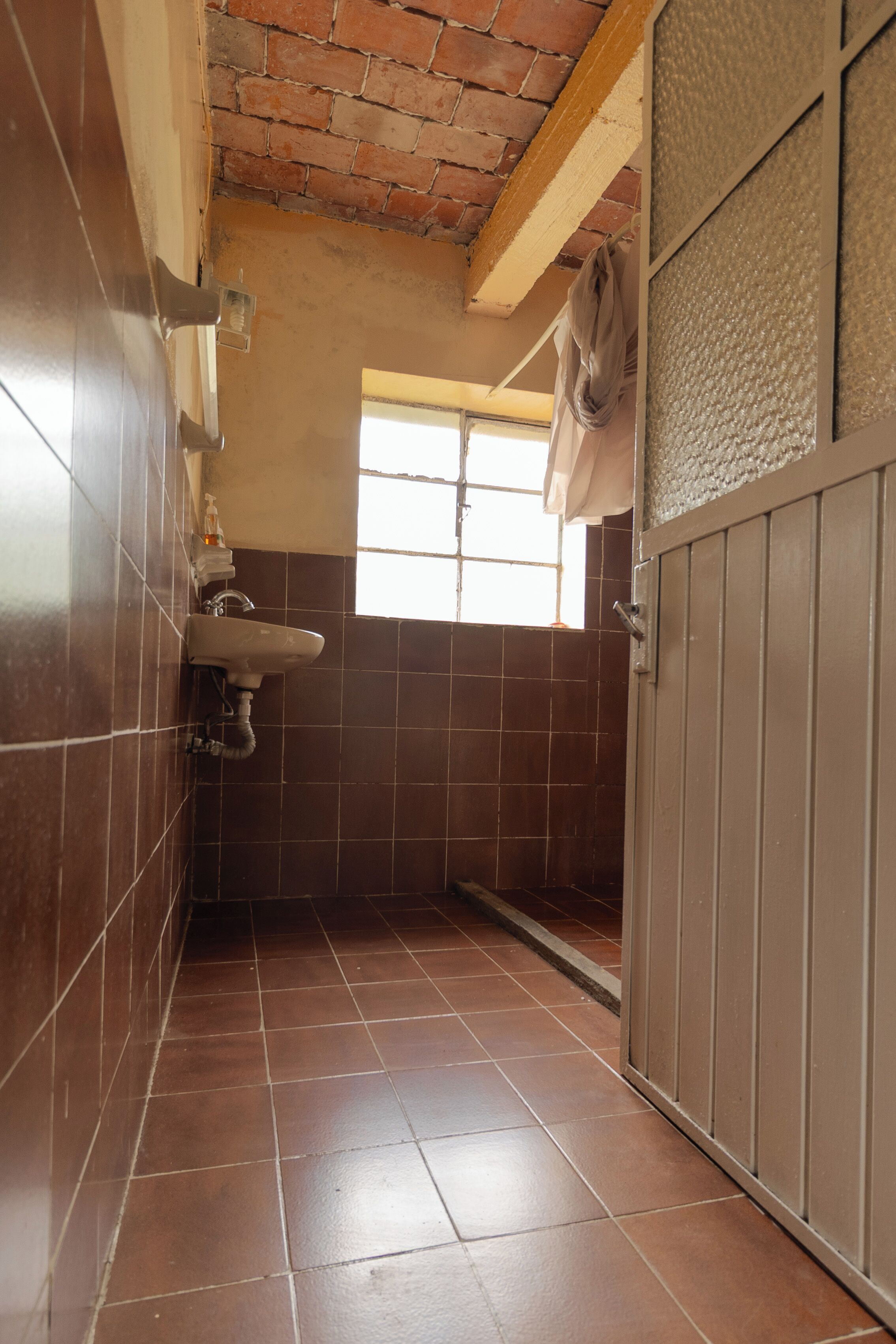 Shower, towels, soap, toilet paper