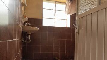 Shower, towels, soap, toilet paper