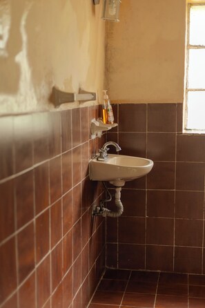 Shower, towels, soap, toilet paper