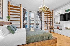 1 chambre, fer et planche à repasser