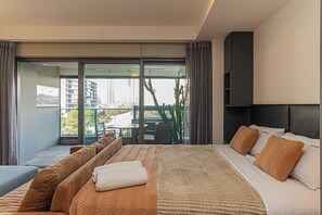 1 bedroom, desk, iron/ironing board, travel crib