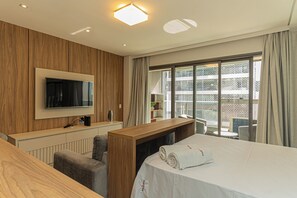 1 bedroom, desk, iron/ironing board, travel crib