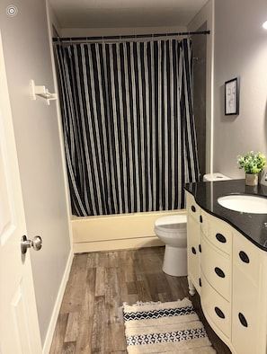 Hair dryer, towels, soap, toilet paper