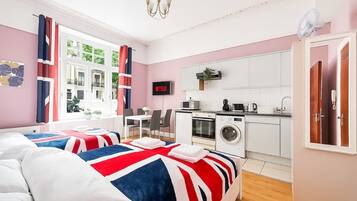 1 chambre, fer et planche Ă repasser, Wi-Fi, draps fournis