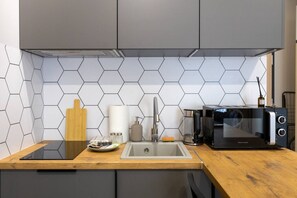 Fridge, microwave, stovetop, high chair