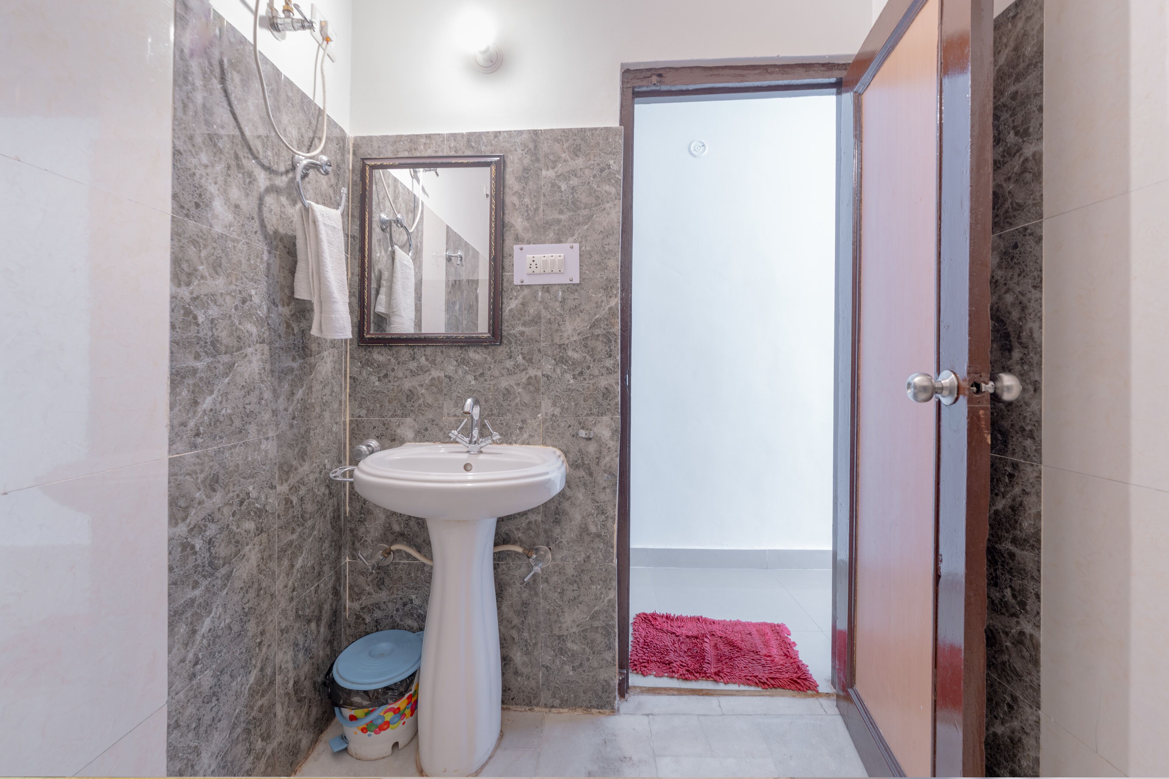 Shower, slippers, towels, soap