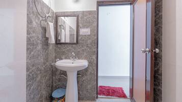 Shower, slippers, towels, soap