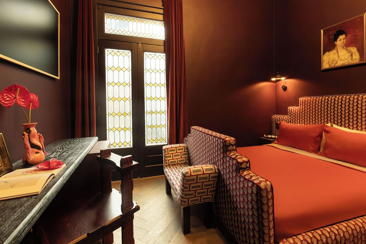 Comfort Room, Courtyard View | In-room safe, desk, soundproofing, free WiFi