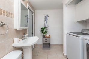 Hair dryer, towels, soap, toilet paper