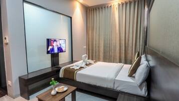 Deluxe-Einzelzimmer | Zimmersafe, laptopgeeigneter Arbeitsplatz, Bügeleisen/Bügelbrett