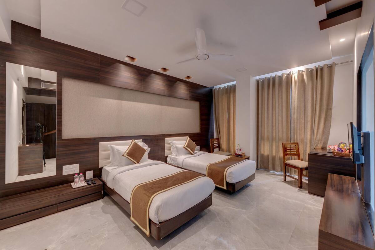 Premium bedding, memory-foam beds, minibar, in-room safe