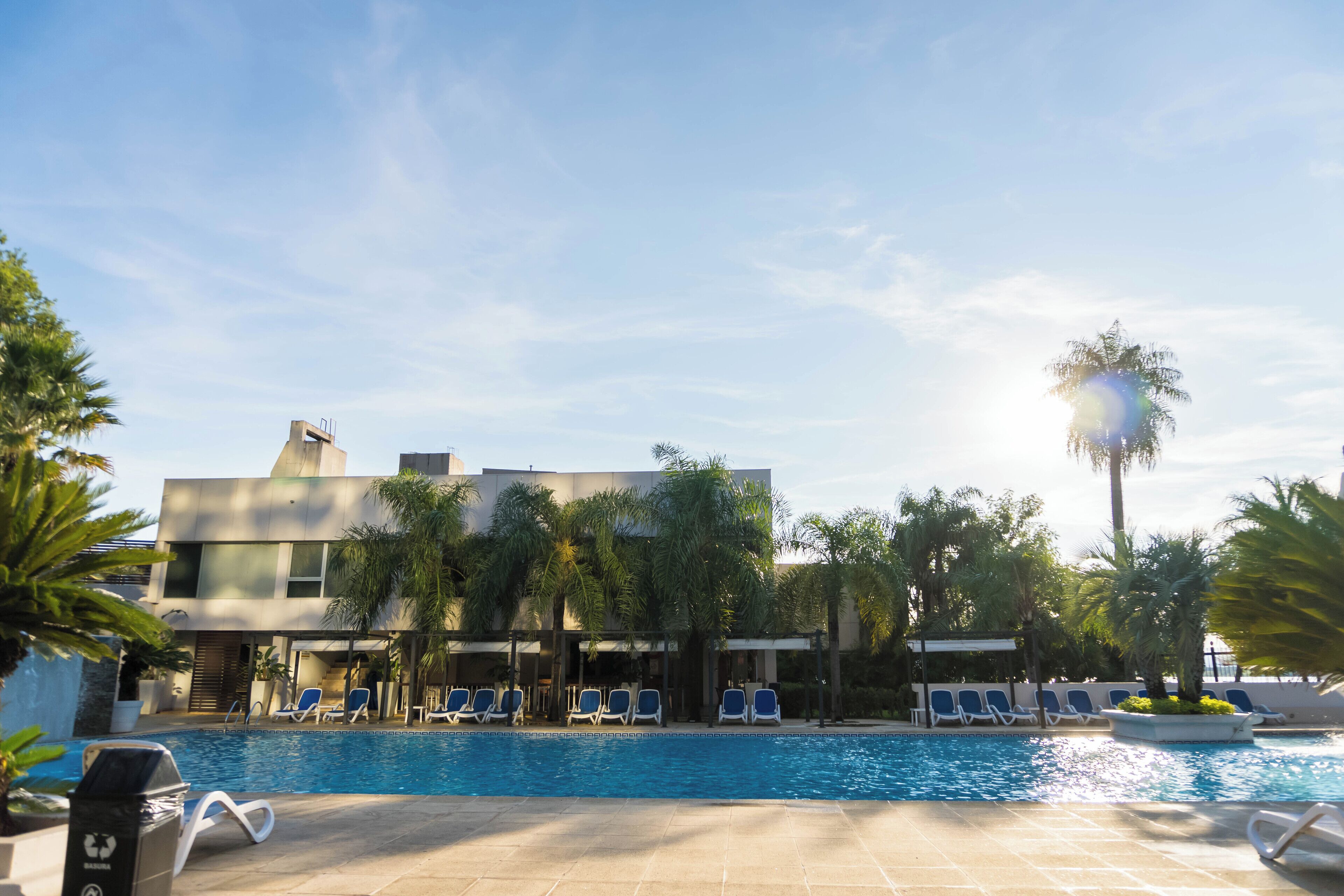 Indoor pool, outdoor pool, pool umbrellas, pool loungers