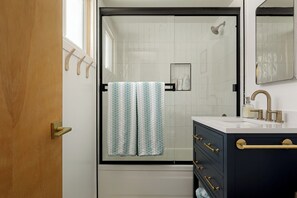 Hair dryer, towels, soap, shampoo