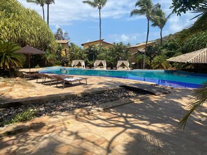 2 outdoor pools, open 8:00 AM to 8:00 PM, pool umbrellas, pool loungers