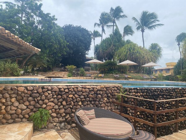 2 outdoor pools, open 8:00 AM to 8:00 PM, pool umbrellas, sun loungers
