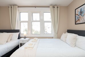 1 habitación, tabla de planchar con plancha, wifi gratis y ropa de cama 
