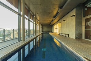 Indoor pool, a heated pool - Lumen Studio - Space, Wi-Fi and Gym in Brooklin (São Paulo)