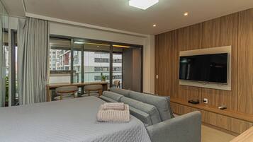 1 bedroom, desk, iron/ironing board, travel crib