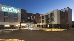 A modern hotel with a prominent sign reading "OSTORIA L'emprise Périgord". - Hôtel Ostoria Périgueux, BW Signature Collection (Marsac-sur-l'Isle)