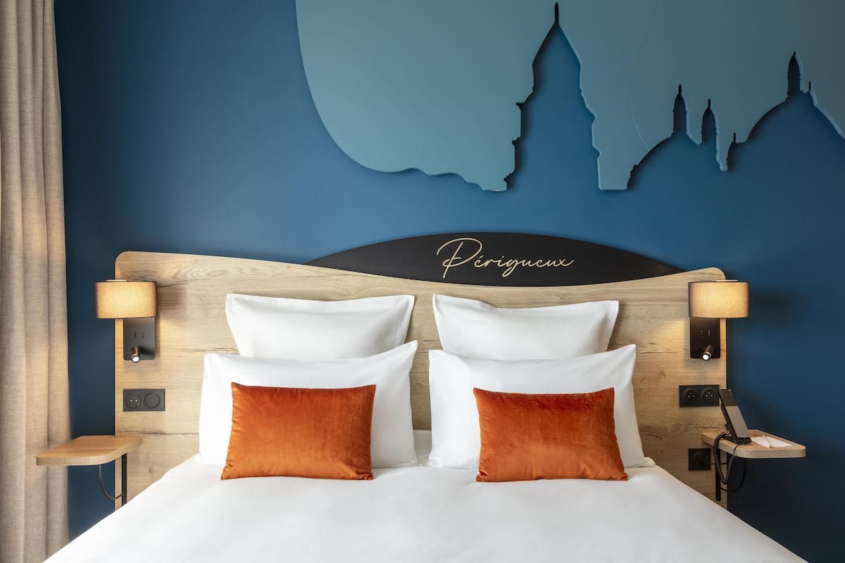 Luxe beddengoed, een kluis op de kamer, individueel gedecoreerd