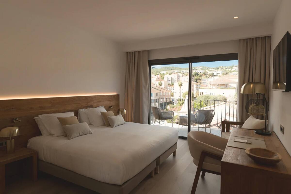 Premium bedding, memory-foam beds, minibar, in-room safe