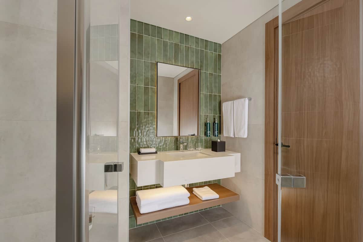 Eco-friendly toiletries, hair dryer, bathrobes, slippers