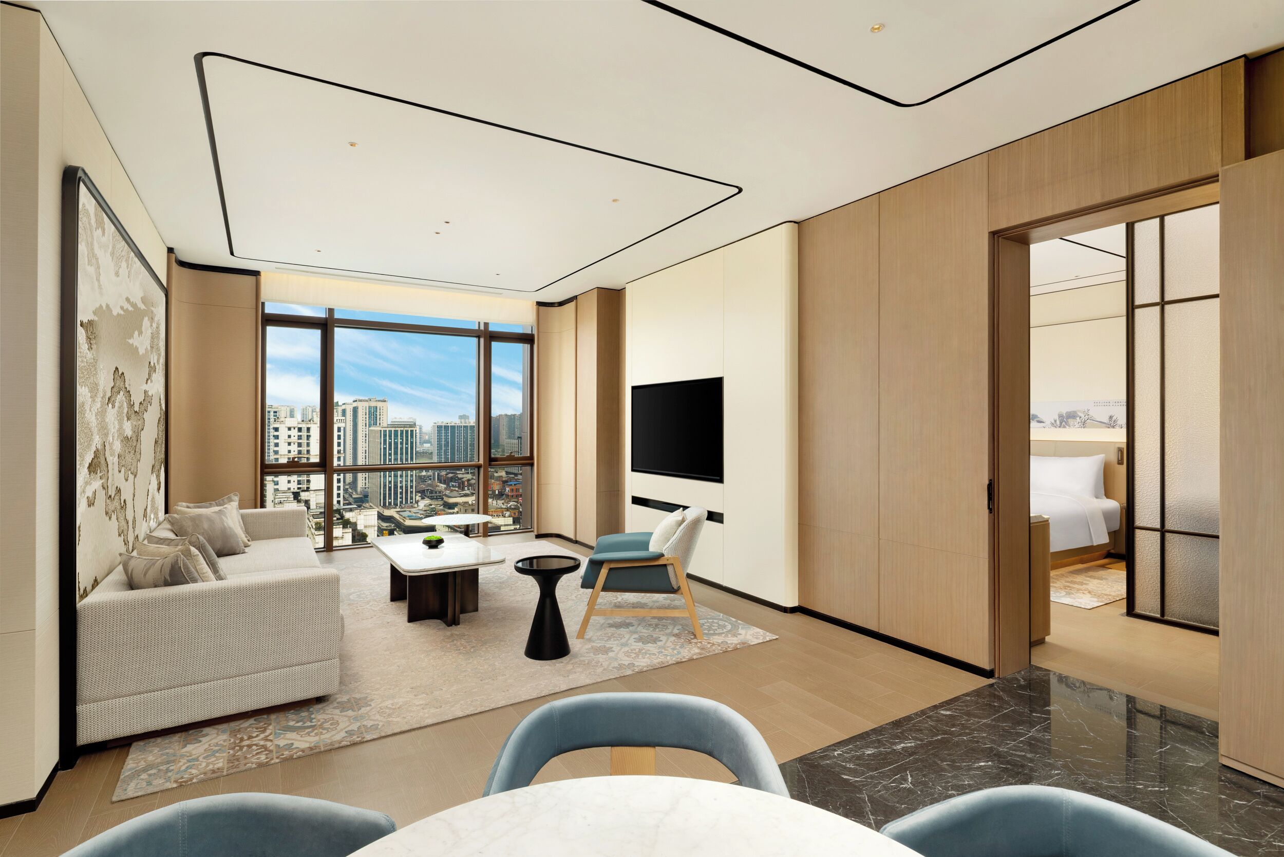 Family Suite, 1 King Bed | Living area | 55-inch TV with cable channels