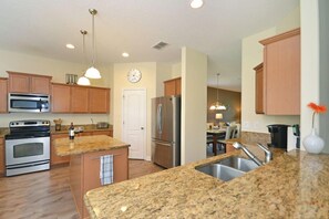 Fridge, microwave, oven, stovetop - Luxury West Haven Villa Private Pool, Hot Tub, Games Room (Davenport)