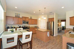 Fridge, microwave, oven, stovetop - Luxury West Haven Villa Private Pool, Hot Tub, Games Room (Davenport)