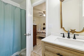 Shower, towels, soap, toilet paper