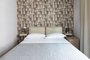 Deluxe Room, 2 Bedrooms, City View | In-room safe, blackout drapes, free WiFi