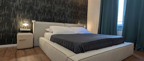 Deluxe Double Room, Courtyard View | In-room safe, blackout drapes, free WiFi
