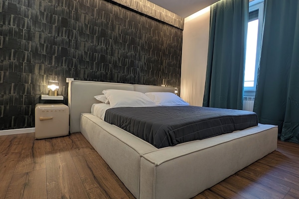 Deluxe Double Room, Courtyard View | In-room safe, blackout drapes, free WiFi