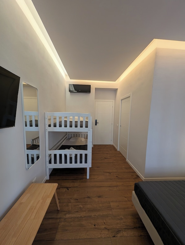 Deluxe Room, 2 Bedrooms, City View | In-room safe, blackout drapes, free WiFi