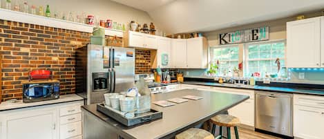 Dishwasher, coffee/tea maker, cookware/dishes/utensils