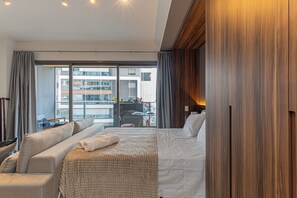 1 bedroom, desk, iron/ironing board, travel crib