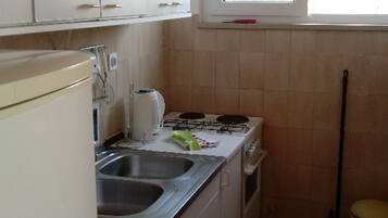 Apartment (Two Bedroom Apartment with Sea View a) | Private kitchen | Fridge