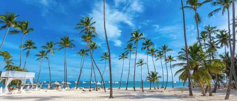 Private beach, white sand, beach cabanas, beach massages