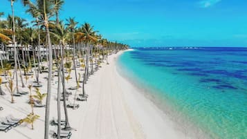 Private beach, white sand, beach cabanas, beach massages
