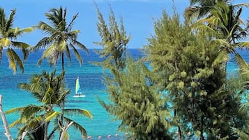 Private beach, white sand, beach cabanas, beach massages