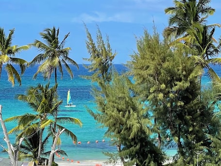 Private beach, white sand, beach cabanas, beach massages