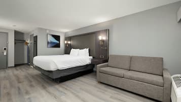 Planxa i posts de planxar, wifi gratuïta i roba de llit