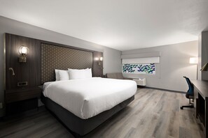 Tabla de planchar con plancha, wifi gratis y ropa de cama 