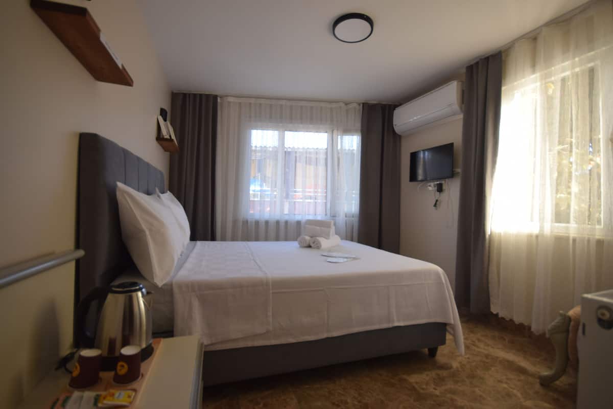 Quarto standard, vista para a cidade | Wi-Fi de cortesia