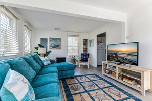Smart TV, fireplace, books