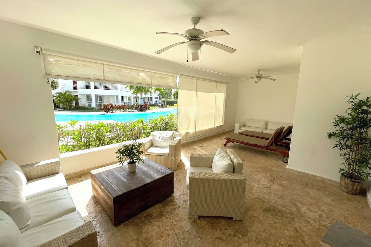 Apartment, Poolside | Living area | 43-inch flat-screen TV with cable channels